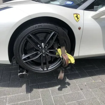 Ferrari wheel secured with soft straps